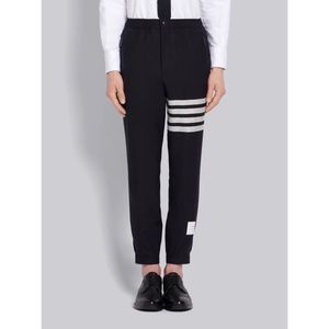 NWT THOM BROWNE NAVY PLAIN WEAVE SUITING SNAP FRONT TRACK TROUSER
